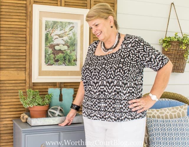 A simple black and white short sleeved knit top looks great with white linen pants. A classic summer outfit.