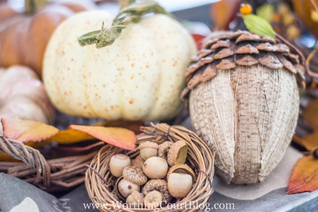 Acorns in a dish on the table.
