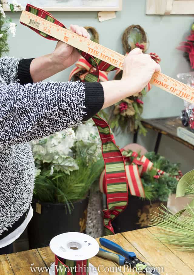 Tying the bow properly and using a ruler to make sure it is all equal.