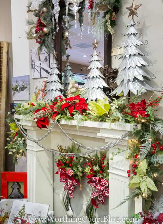 How To Decorate A Christmas Garland - Directions From A Pro with a fireplace mantel all decorated.