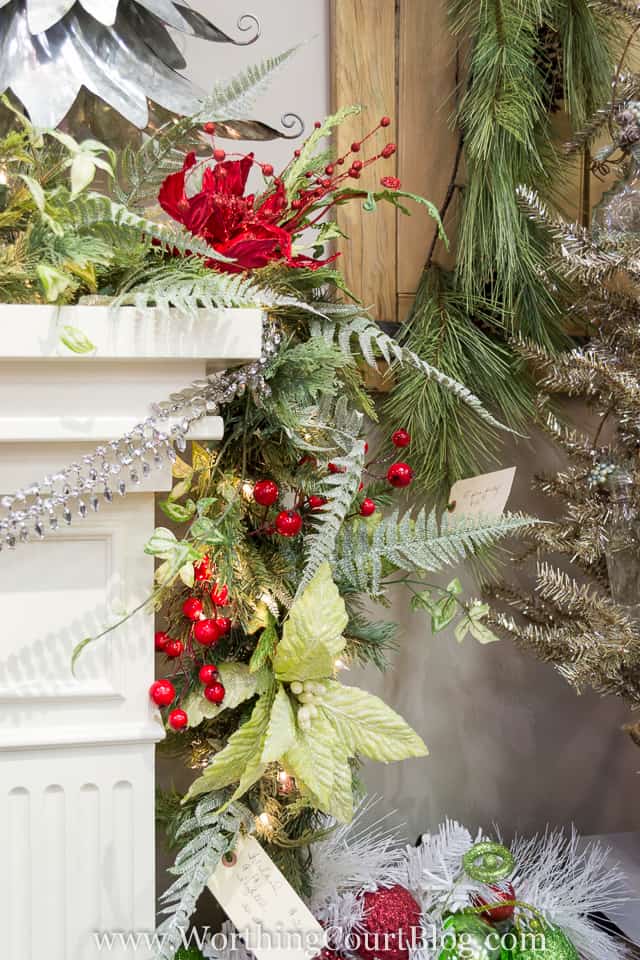 The garland trailing down the side of the mantel.