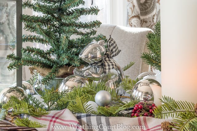 There is a silver chipmunk in the centerpiece.