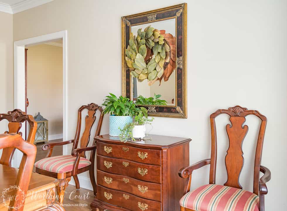 A mirror in the dining room.