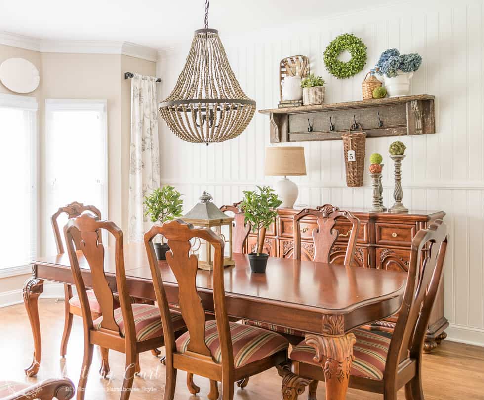 Combining farmhouse touches with traditional dining room furniture.