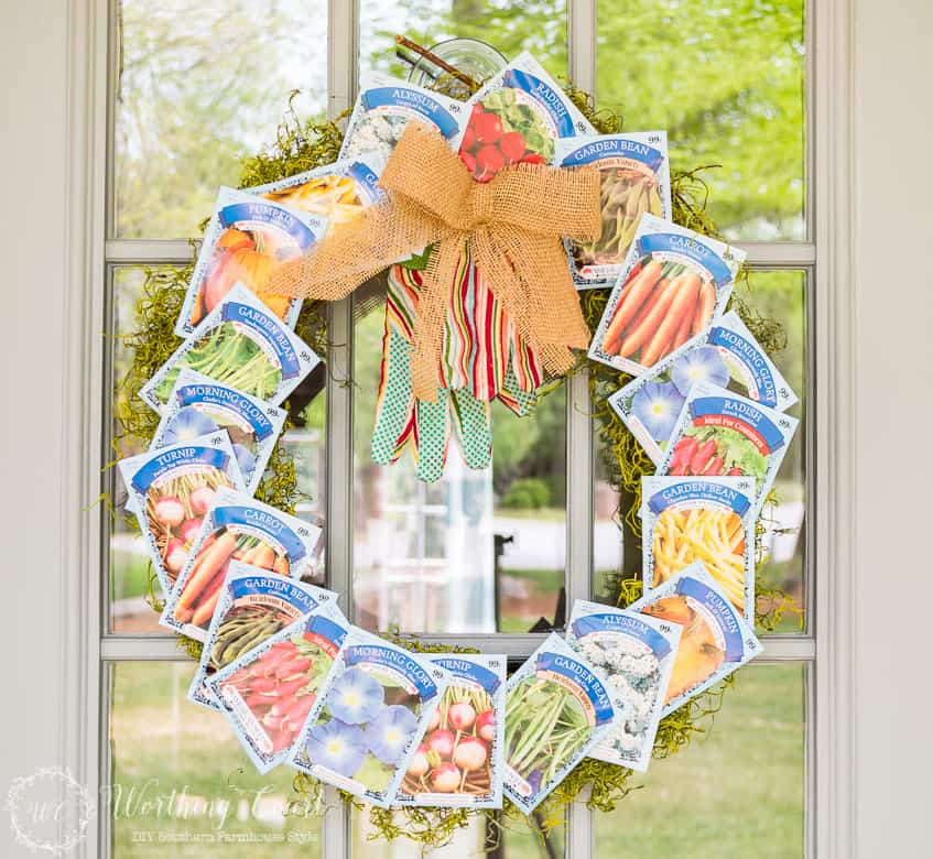 DIY wreath made with seed packets and a bow.