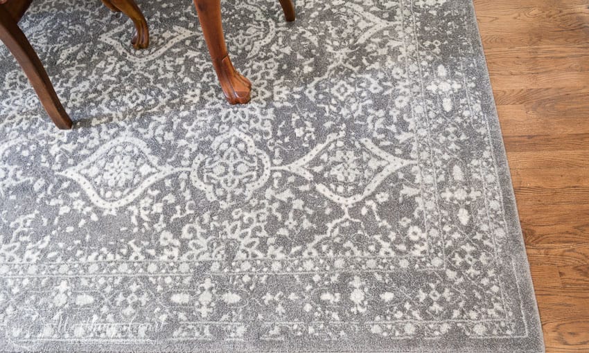 Grey and white rug up close.