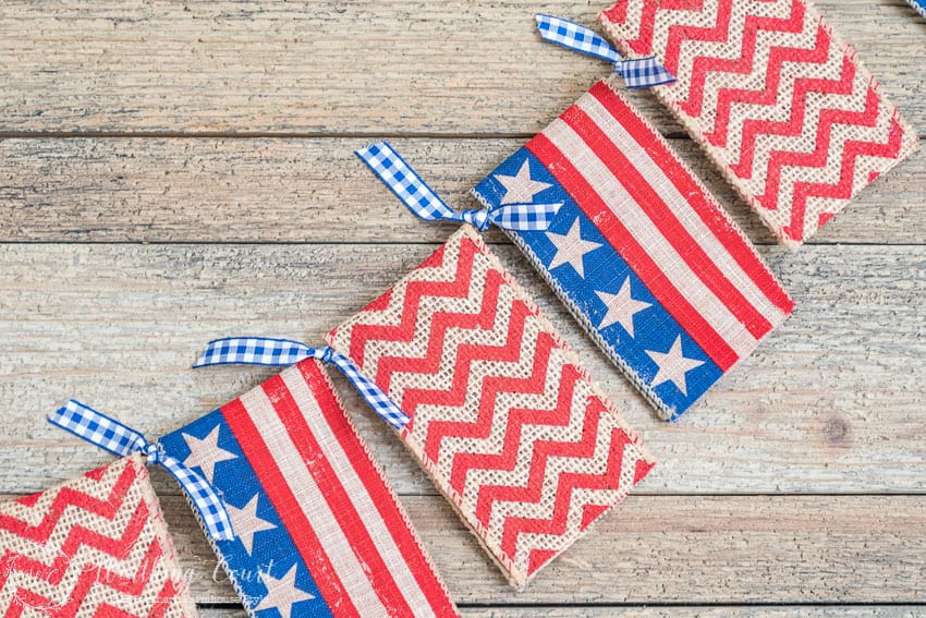 The red, white and blue fabric banner.