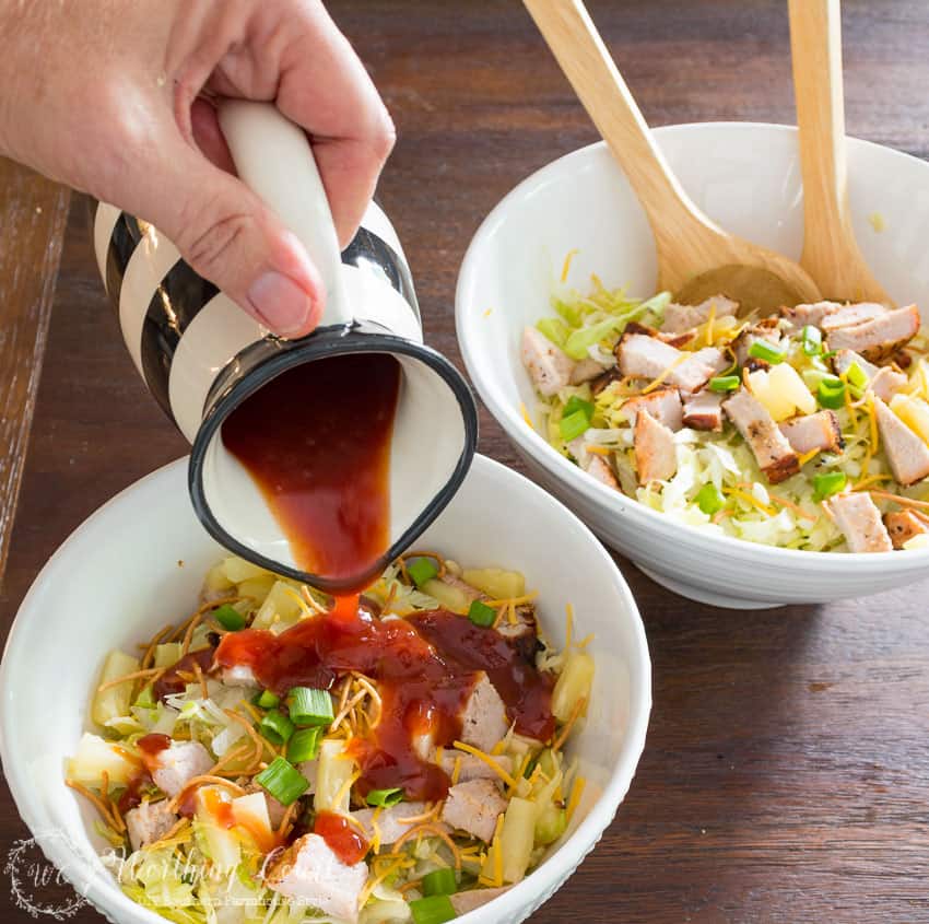 Fast and easy Asian salad with pre-marinated grilled pork tenderloin and sweet bbq dressing.