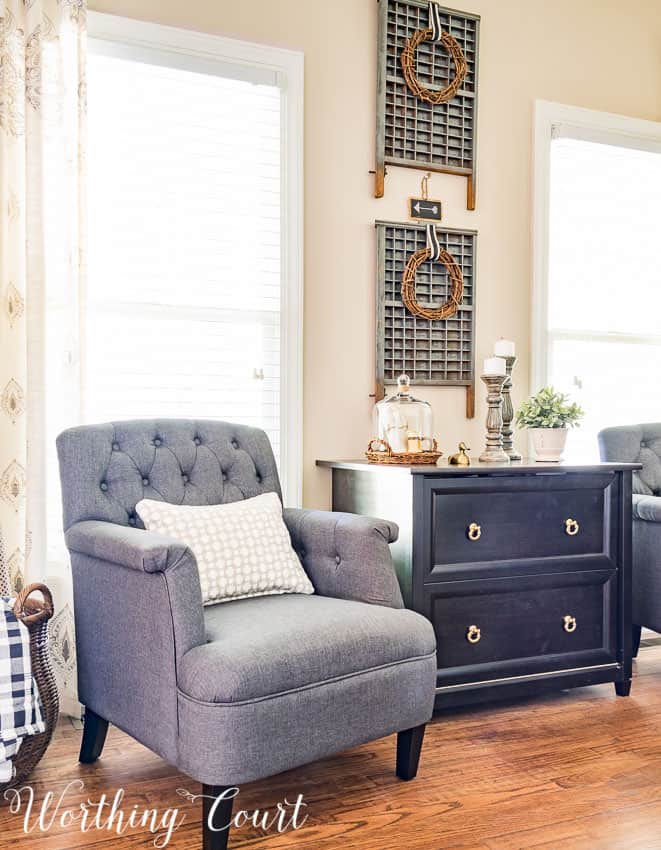 Gray office chairs and vintage printer's trays for a farmhouse office.