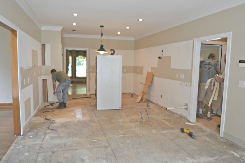 The flooring in the kitchen being removed.