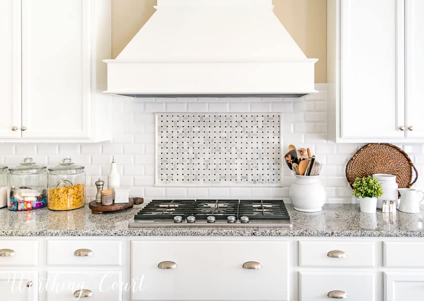 White backsplash in the kitchen.