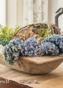 dough bowl filled with spring decorations