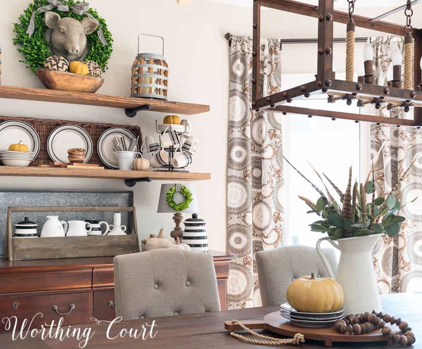 Fall rustic open shelves and centerpiece in the dining room.