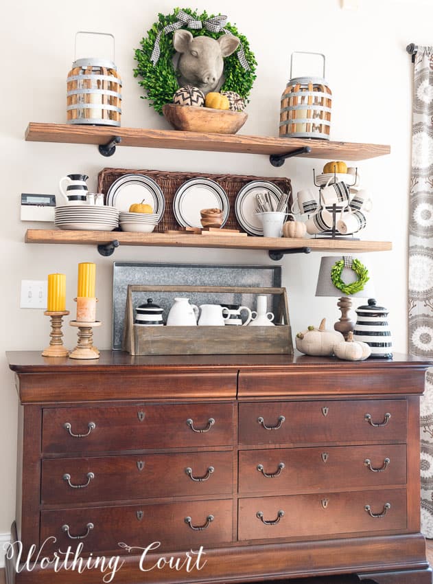 Rustic open shelves decorated for fall with wood tones, soft golds and black and white || Worthing Court