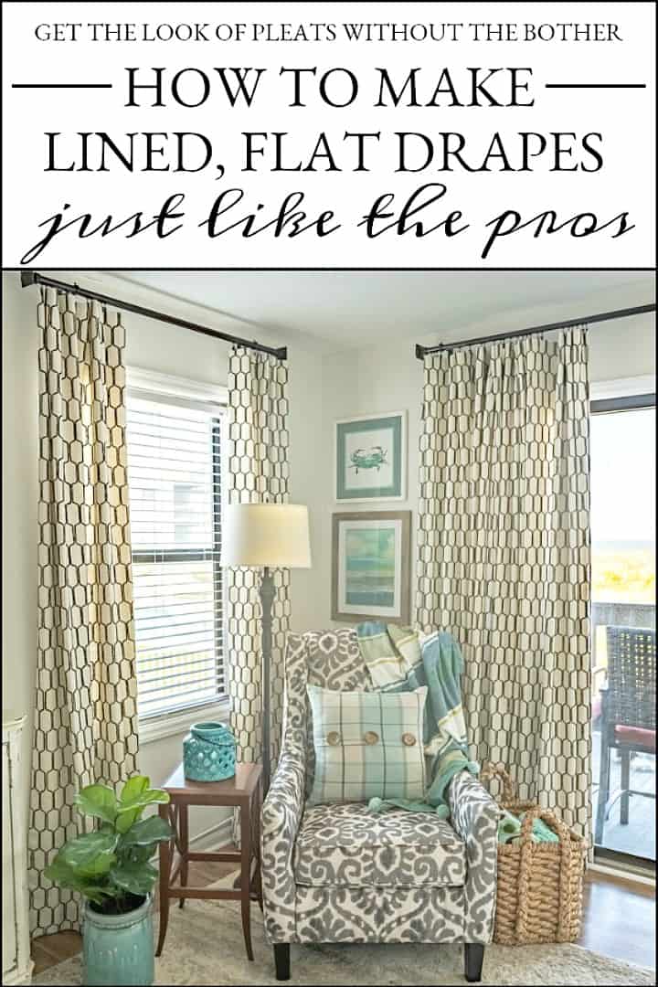 DIY drapery panels on corner windows with arm chair and art