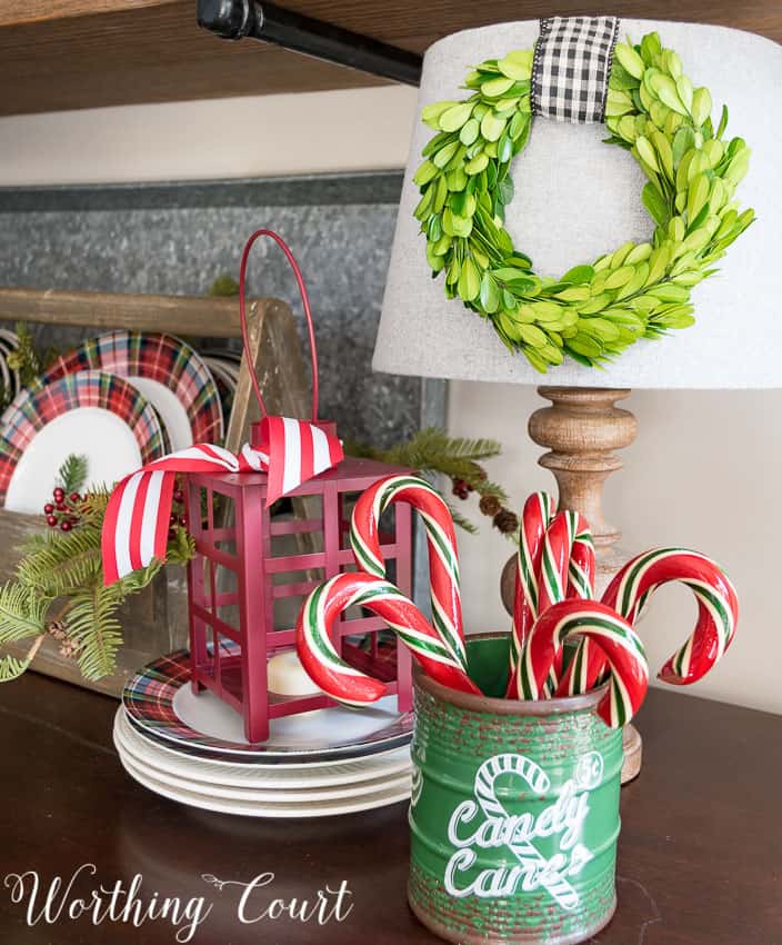 Christmas lantern and candy canes in the breakfast nook.