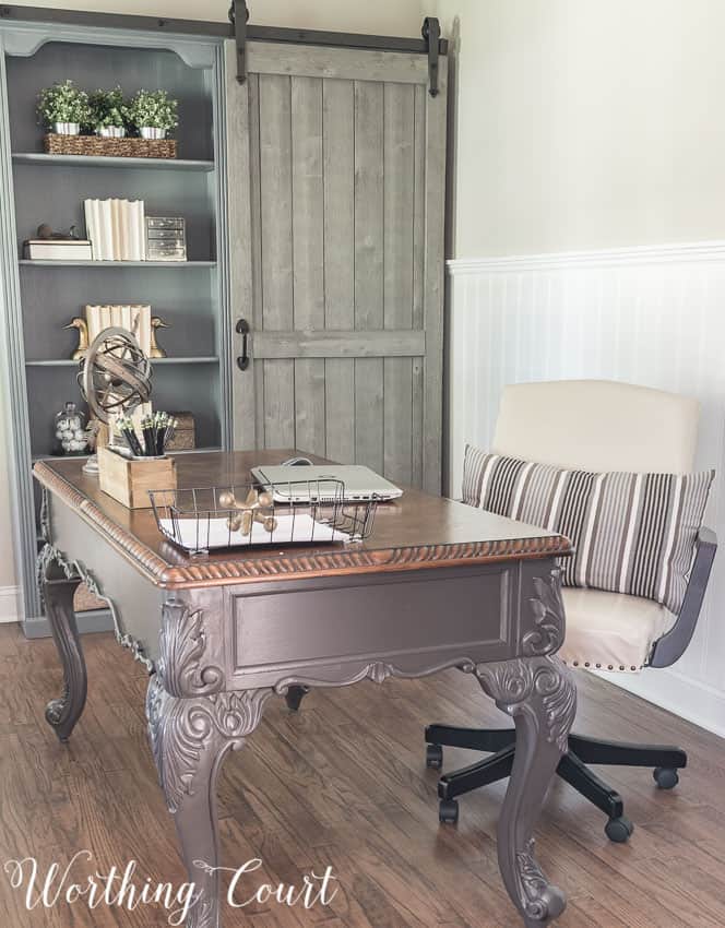 Up close picture of the desk and the barn door bookcase.