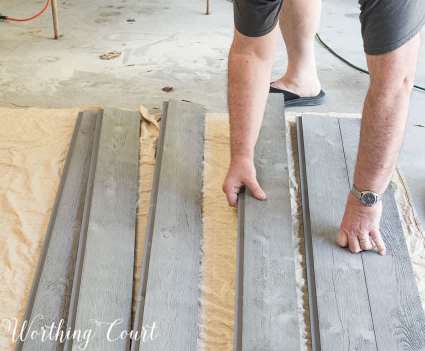 Laying out the wood for a diy barn door.