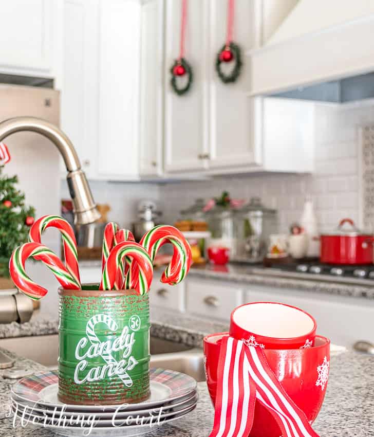 Christmas candy cane vignette on the counter in the kitchen.