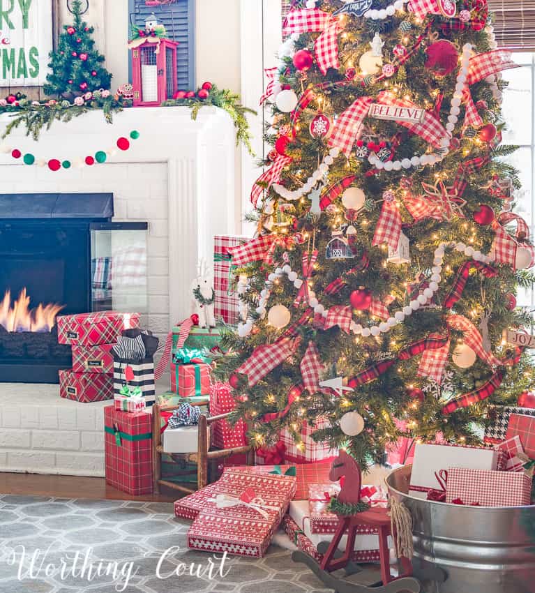 Display Christmas gifts in unexpected containers such as a galvanized tin bucket.