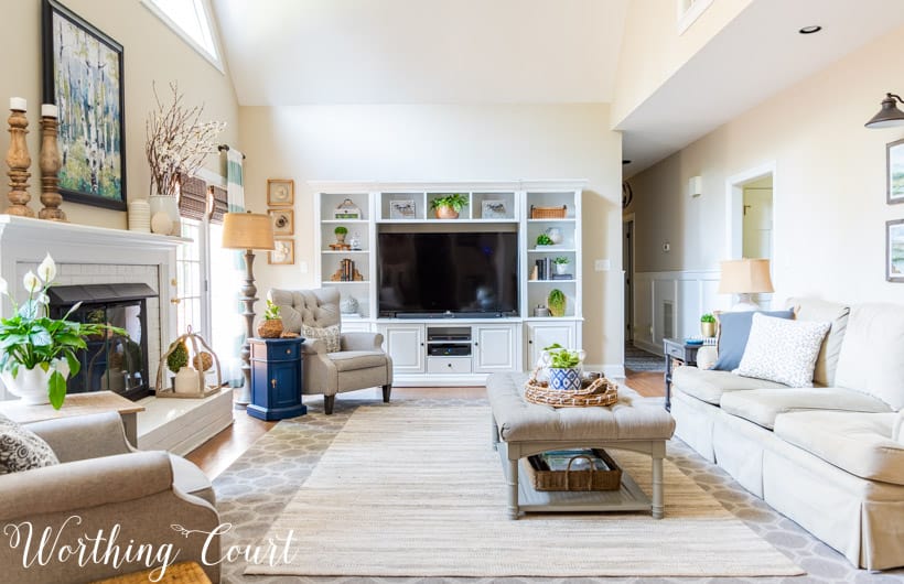 family room with white entertainment center and neutral furniture