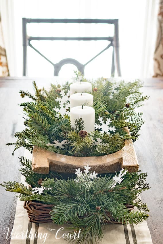 Easy farmhouse winter centeripece with lots of greenery.