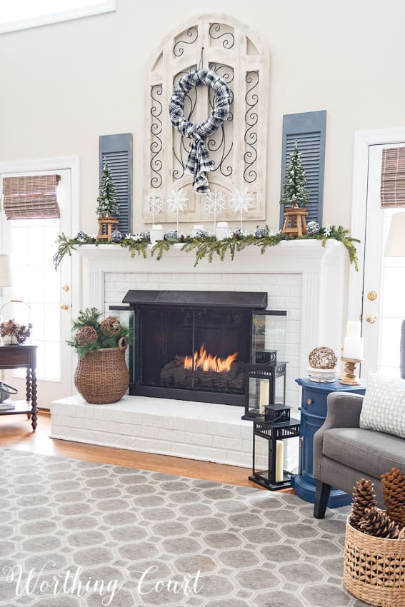 I made sure to use lots of texture and all of the elements of winter when decorating my fireplace. 