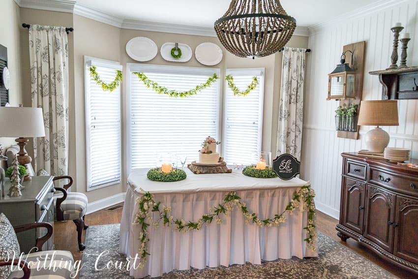 Dining room set up for a wedding cake cutting. 