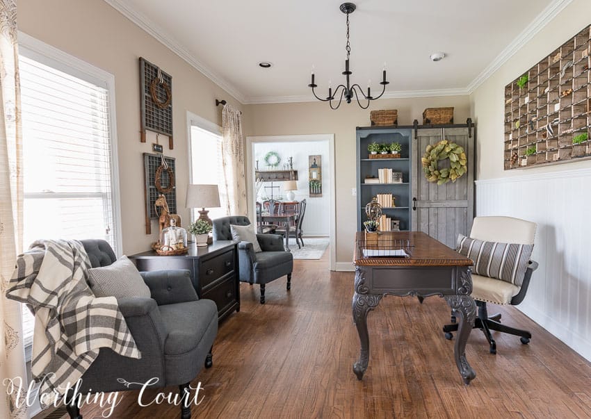 Home office with painted desk and bookcases.