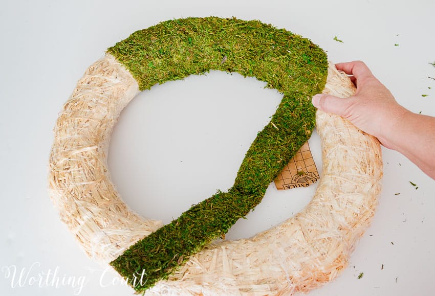 The wreath half covered with the moss.