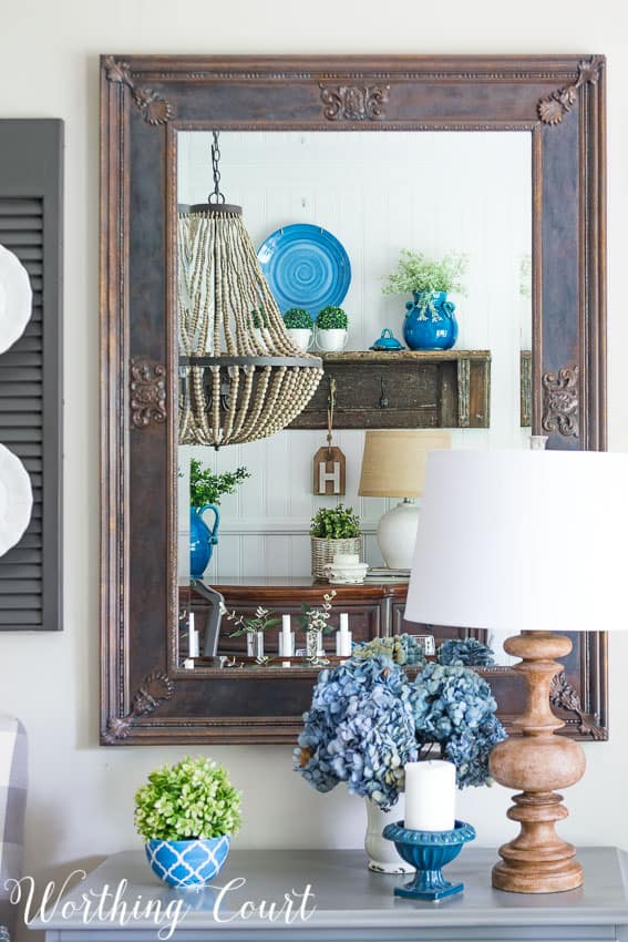 An old rustic mirror in the dining room.