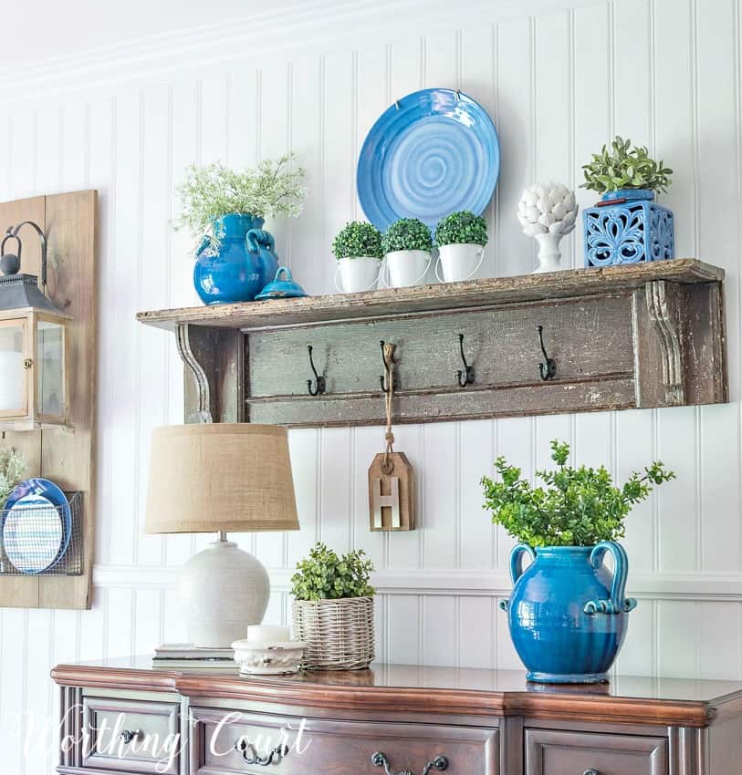 Summer sideboard and vintage shelf vignette in blue.