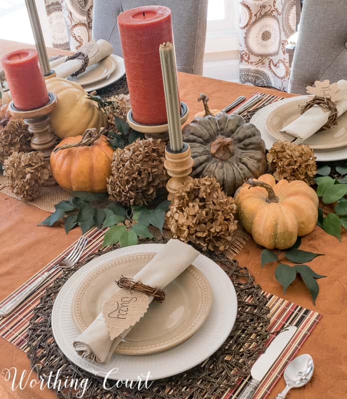 Napkins are wrapped in a natural twine with the persons name on the napkin.