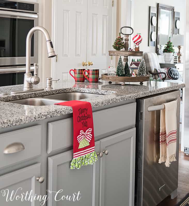 Merry Christmas Y'all kitchen towel on the sink.