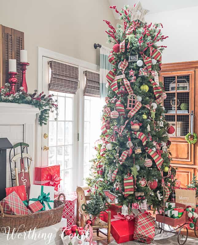 Christmas tree decorated with red and green ornaments and ribbon #christmastree #christmasdecor