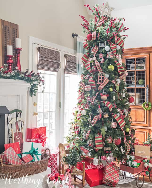 Christmas tree decorated with red and green ornaments and ribbon #christmastree #christmasdecor