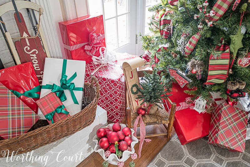 Red and green Christmas wrapping paper with green ribbon #christmasdecor #christmasgifts