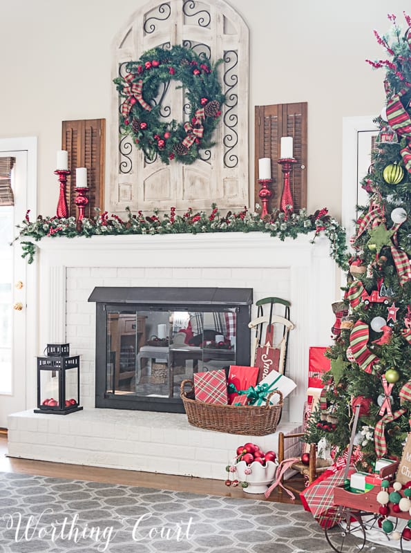 Fireplace and mantel with Christmas decor #christmasdecor #christmasmantel