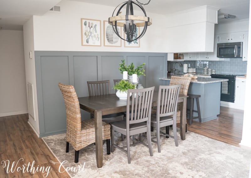 Modern farmhouse dining room, statement chandelier, orb chandelier, rustic industrial, board and batten, abstract art