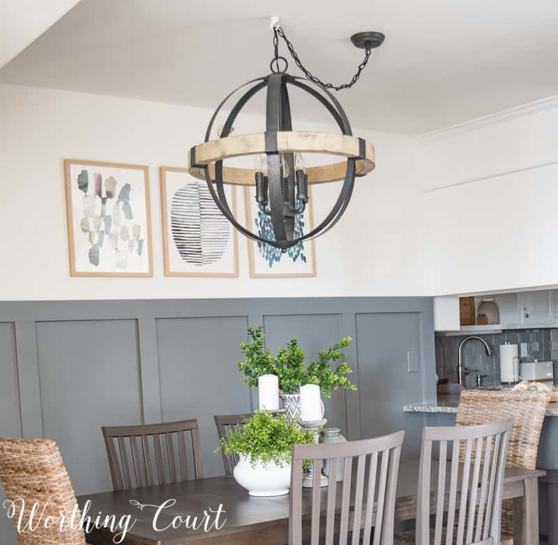 Statement chandelier in a small dining room, rustic industrial, modern farmhouse, orb chandelier