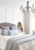 bedroom with white board and batten feature wall behind headboard