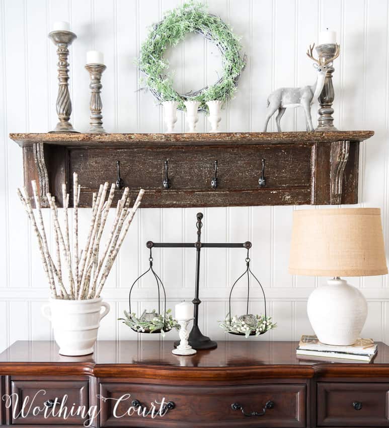 Sideboard with white accessories.