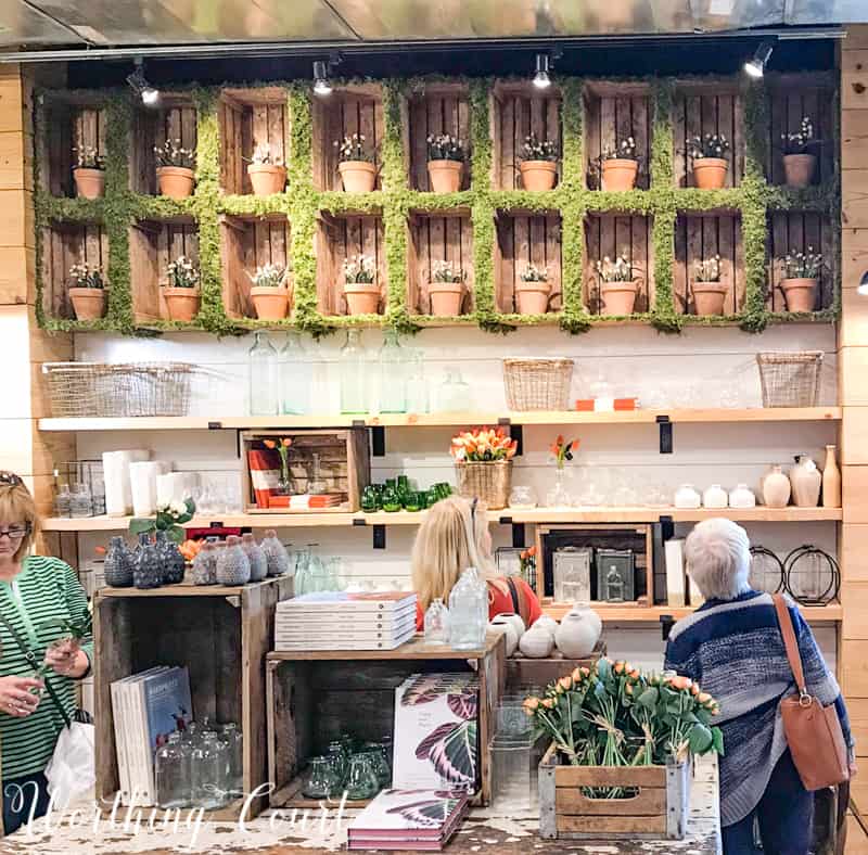 Moss covered cubbies in Magnolia Market. This would be easy to replicate with a small cubbie organizer. #decoratingideas #magnoliamarket #fixerupper #moss #springdecoratingideas