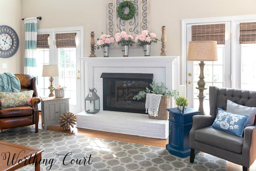 Spring mantel decor with pink flowers