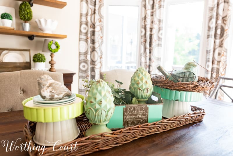 Dining table centerpiece using blue and aqua accessories from the #TrishaYearwood Collection at #TractorSupply #springdecor #springdecoratingideas #centerpieceideas #aqua #limegreen #HomeDecor #SouthernStyle