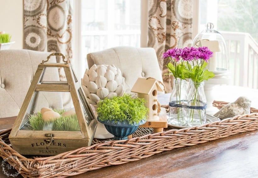 Spring centerpiece on a wicker tray.