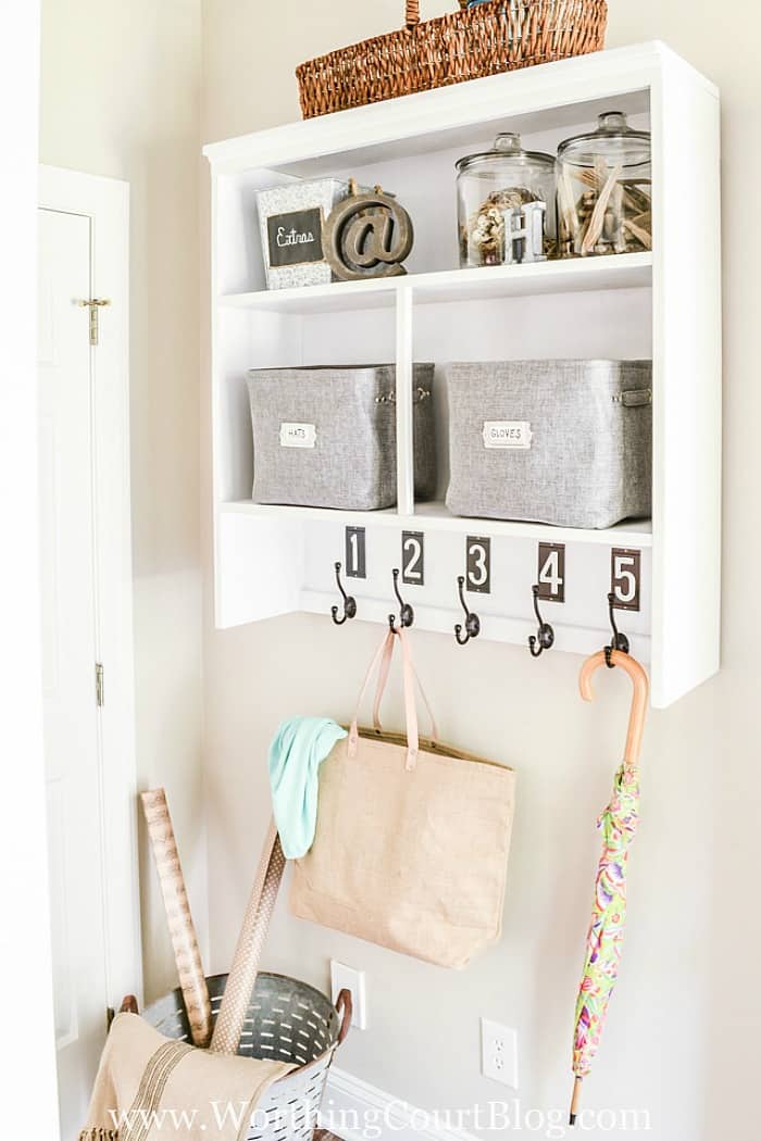 Need a place to keep those coats, bookbags and purses? Repurpose the top of an old hutch into a dropzone and mount it on the wall. #organizingideas #dropzoneideas #mudroomideas.#upcyclingideas #repurposedfurniture #repurpose #upcycledfurniture #upcycledideas