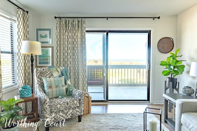 Video tour of completely remodeled living room, dining room and kitchen of a beach condo. #coastaldecor #beachdecor #coastalliving #coastaldecoratingideas