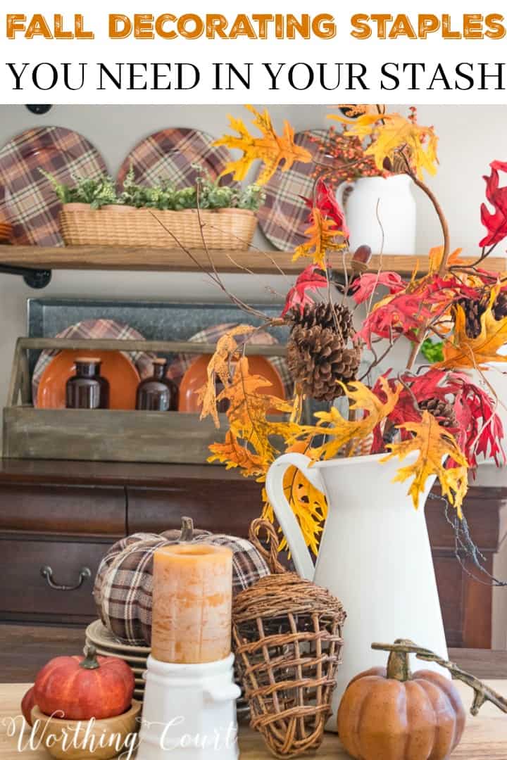 Fall centerpiece with traditional fall foliage poster.