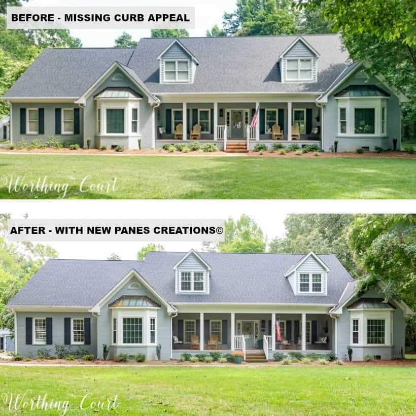 two story brick house painted gray with two bay windows and front porch